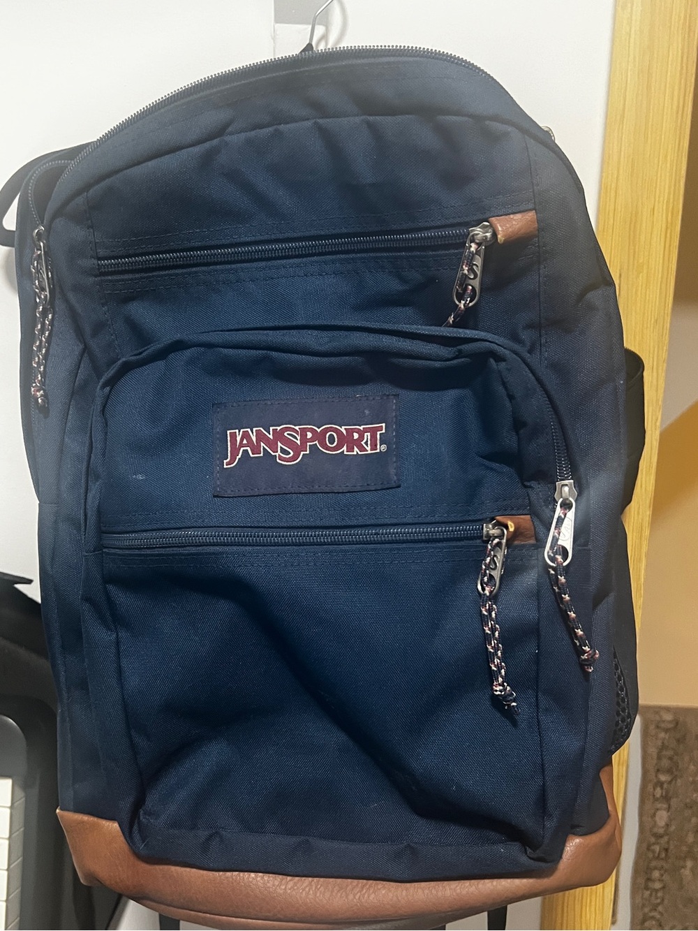 Jansport Navy Backpack with Brown Trim and Leather Base